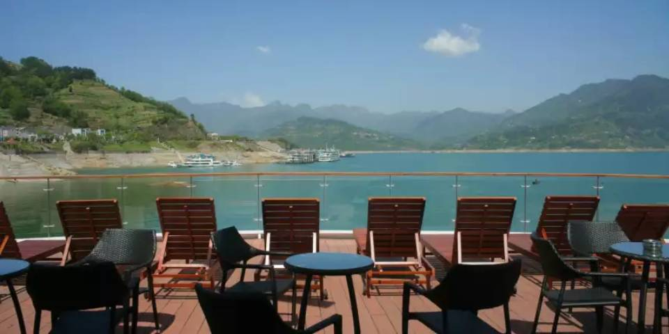 The sun deck features a spacious open-air deck at the bow of the ship, complete with sun loungers.
