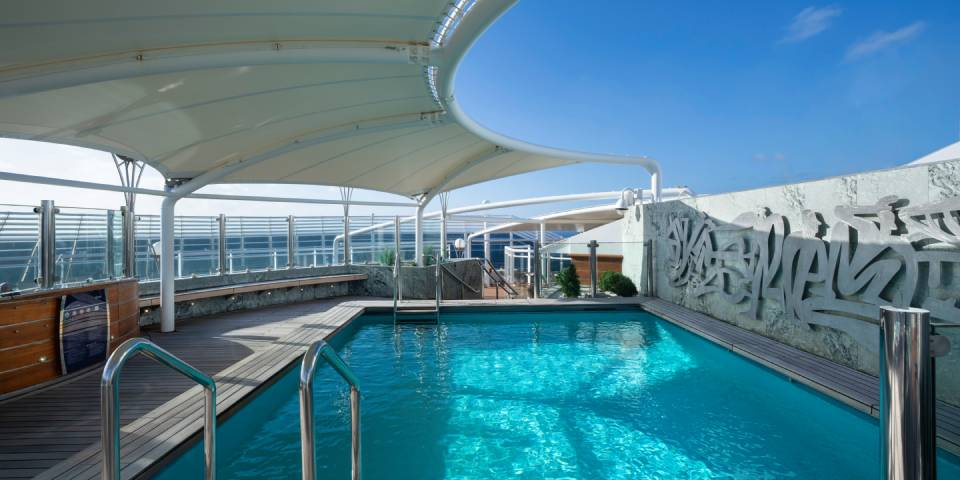 In the MSC Yacht Club you are provided with exceptional service, including fresh towels and cleaning sunglasses while enjoying the One Pool.