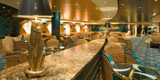 Drink and dance in the African-themed Savannah Bar show lounge. Sit back, relax and enjoy the games, shows and bingo hosted here throughout your voyage