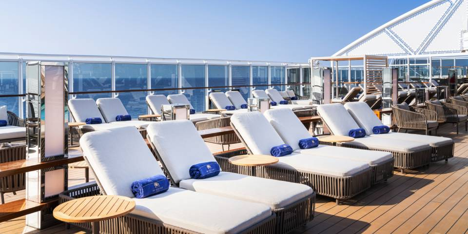 The MSC Yacht Club Sundeck & Pool is an exclusive luxurious outdoor area with captivating swimming pool, spacious sundeck, and relaxing large hot tubs for an remarkable luxury cruise experience.