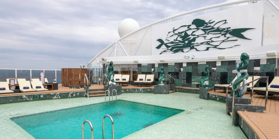 In the MSC Yacht Club you are provided with exceptional service, including fresh towels and cleaning sunglasses while enjoying the One Pool.