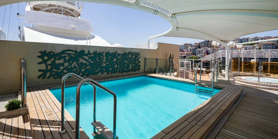 In the MSC Yacht Club you are provided with exceptional service, including fresh towels and cleaning sunglasses while enjoying the One Pool.