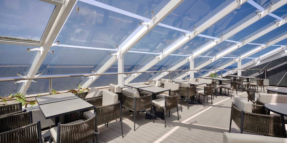 The MSC Yacht Club Grill & Bar is a dedicated outdoor terrace where guests can savour meals and drinks all day long.
