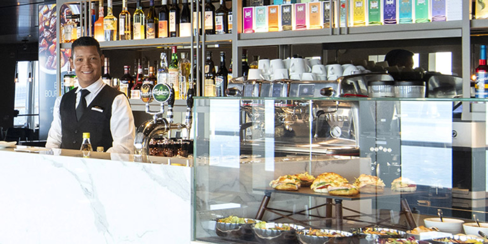 The Azure Bar & Café is a versatile Bar-Deli-Café that beckons you to embrace all-day dining. Enjoy savory light meals, delectable miniature desserts, hot beverages, and premium drink choices in a relaxed and inviting atmosphere.