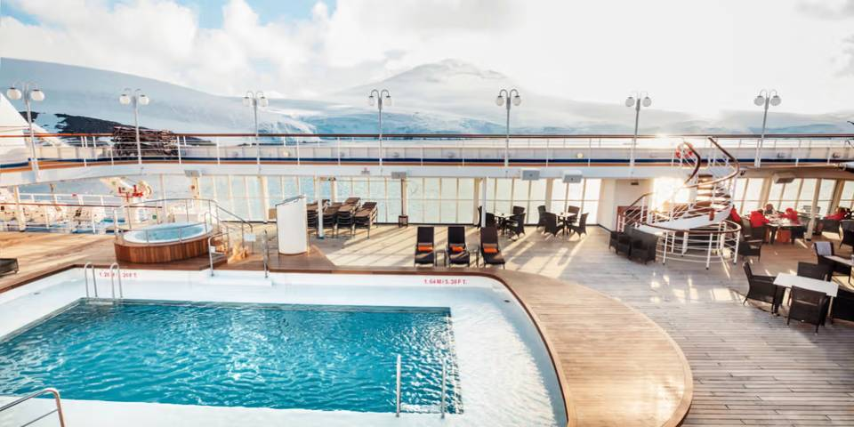 Chaise lounges arranged in the sun or shade. Bubbling whirlpools. The pool water refreshing in warmer climates, heated for cooler weather. The attentive staff at the ready with an oversize towel as you emerge from the pool, with your favorite beverage.